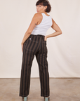 Back view of Black Striped Work Pants in Espresso and vintage off-white Cropped Tank Top on Tiara