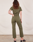 Short Sleeve Jumpsuit in Surplus Green back view on Alex