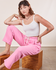 Alex is wearing Cropped Rolled Cuff Sweatpants in Bubblegum Pink and vintage off-white Cami