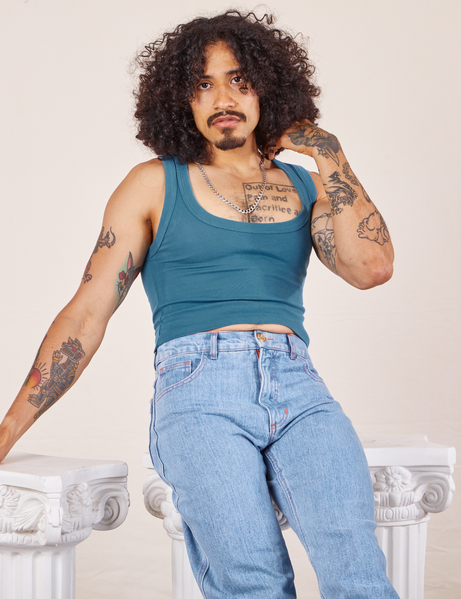 Jesse is 5&#39;8&quot; and wearing XS Cropped Tank Top in Marine Blue