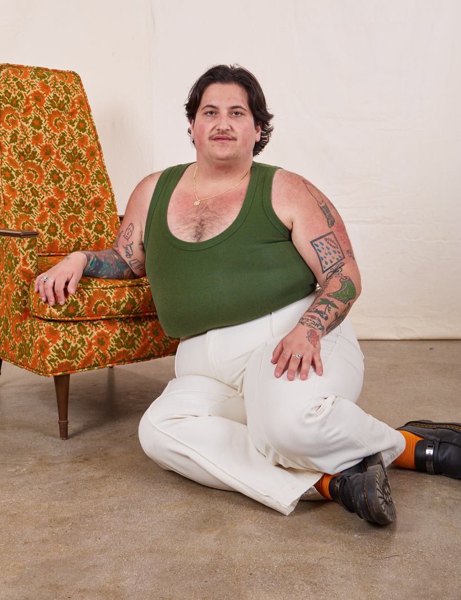 Tank Top in Dark Emerald Green on Sam wearing vintage off-white Western Pants
