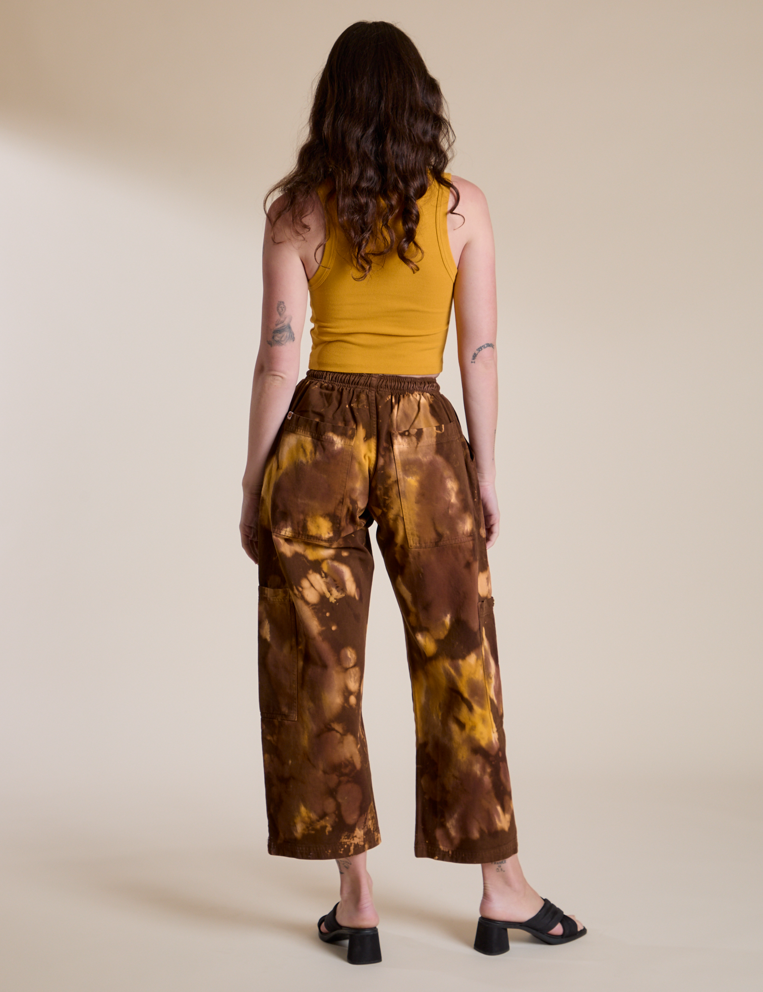 Magic Waters Drop Pocket Pants in Honey Brown back view on Alex