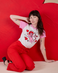 Vintage Tee in Cupid and mustang red Work Pants worn by Alex