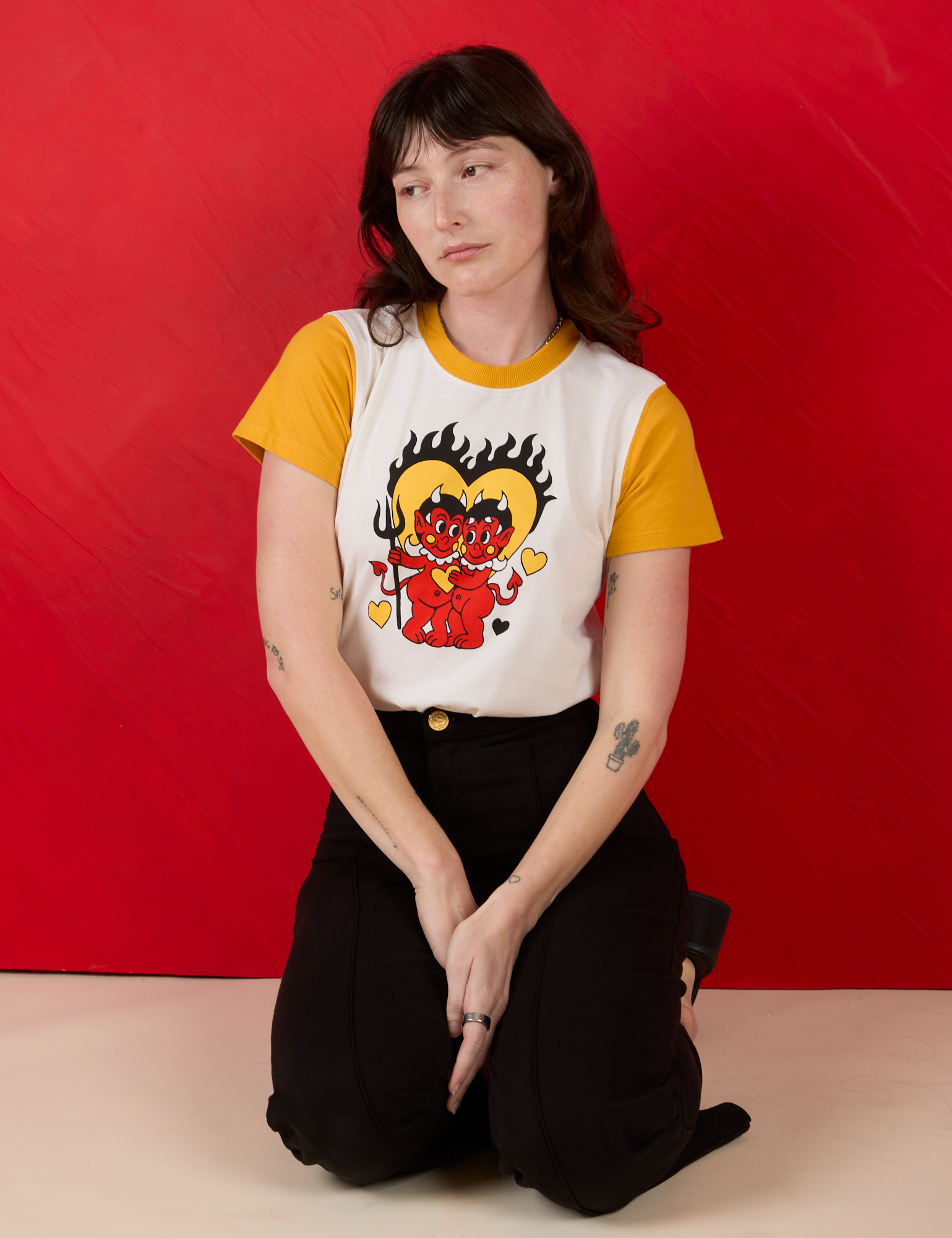 Vintage Tee in Devil Lovers and black Western Pants worn by Alex