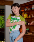 Short Sleeve Raglan Tee in Snap Peas angled front view on Alex