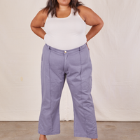 Alicia is 5'9" and wearing 2XL Western Pants in Faded Grape paired with a vintage off-white Tank Top