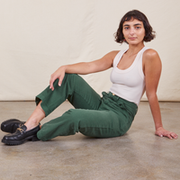 Work Pants in Dark Emerald Green on Soraya wearing vintage off-white Tank Top