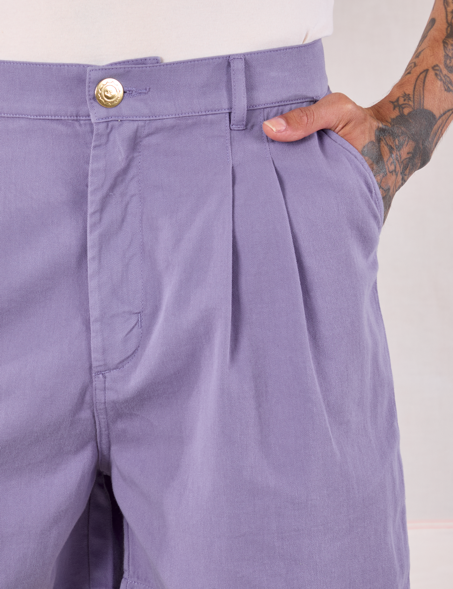 Trouser Shorts in Faded Grape front close up on Jesse