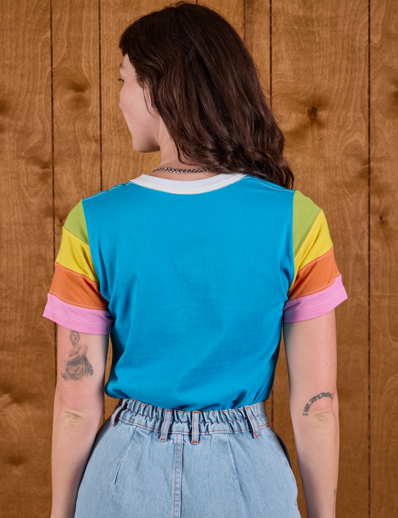 Calypso Tee in Rainbow back view on Alex