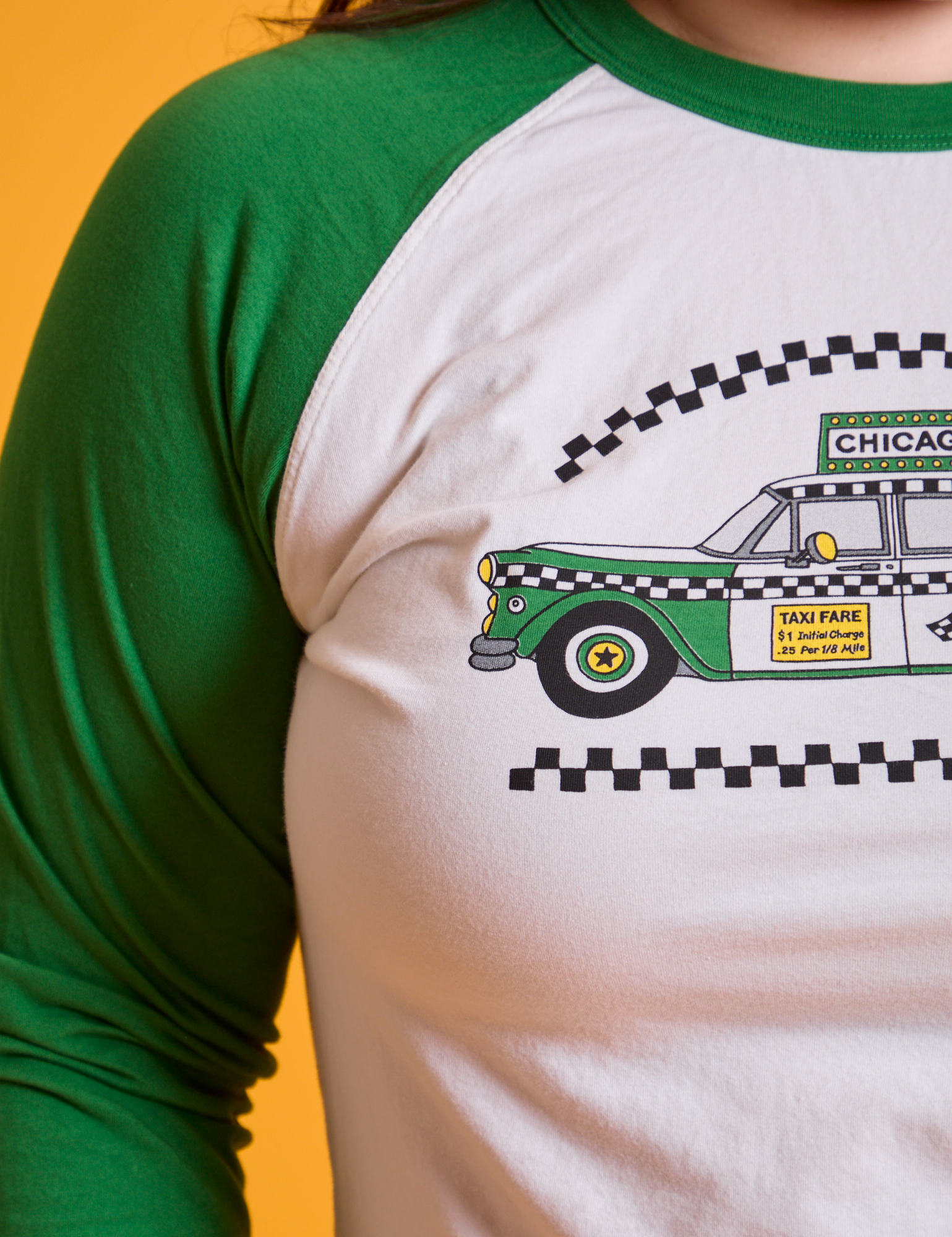 Taxi Raglan Tee in Chicago close up on Ashley