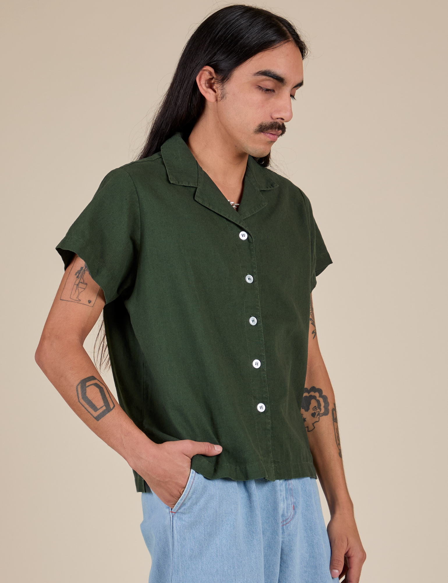 Pantry Button-Up in Swamp Green angled front view on Anthony