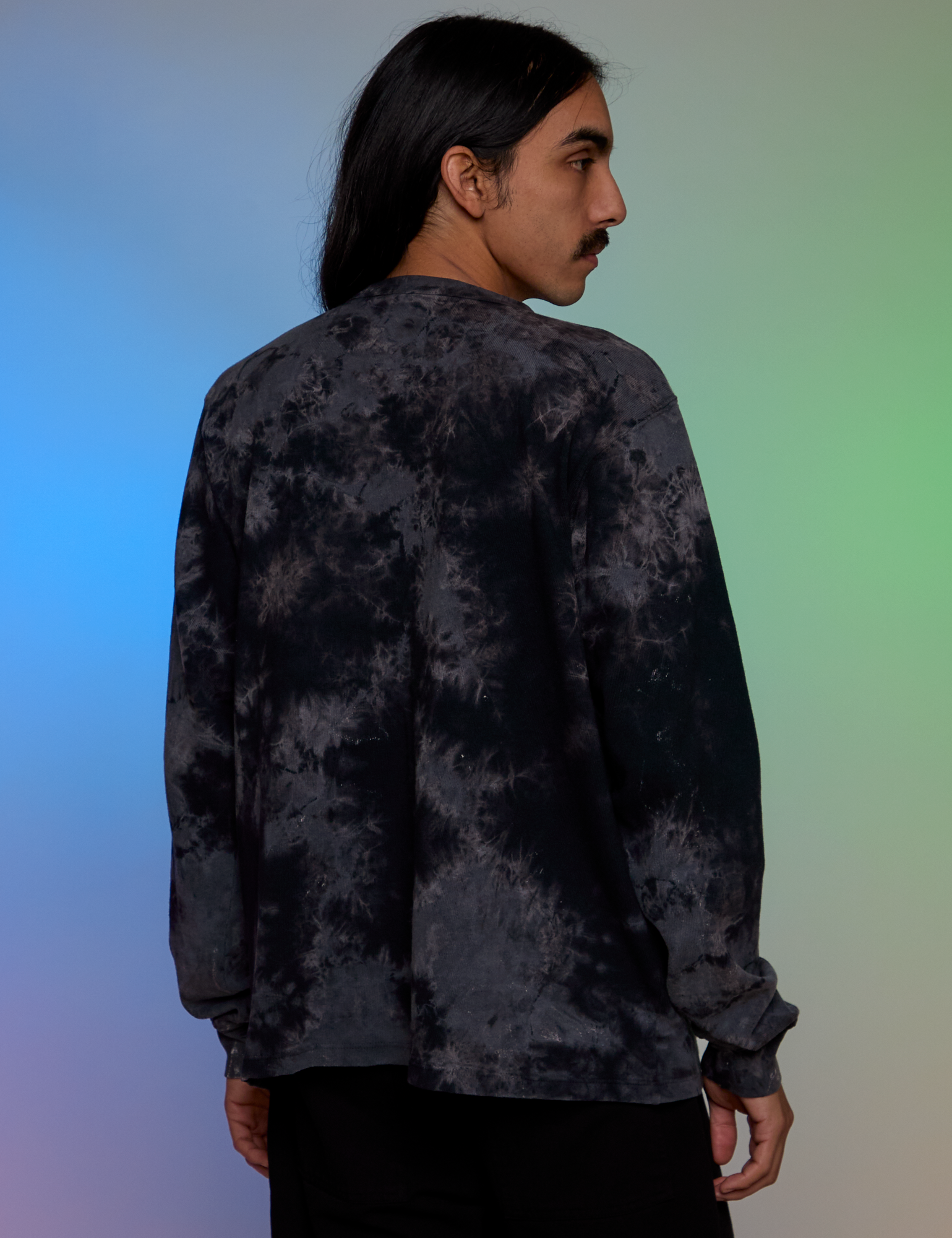 Back view of Magic Waters Long Sleeve Burly Tee in Black on Anthony
