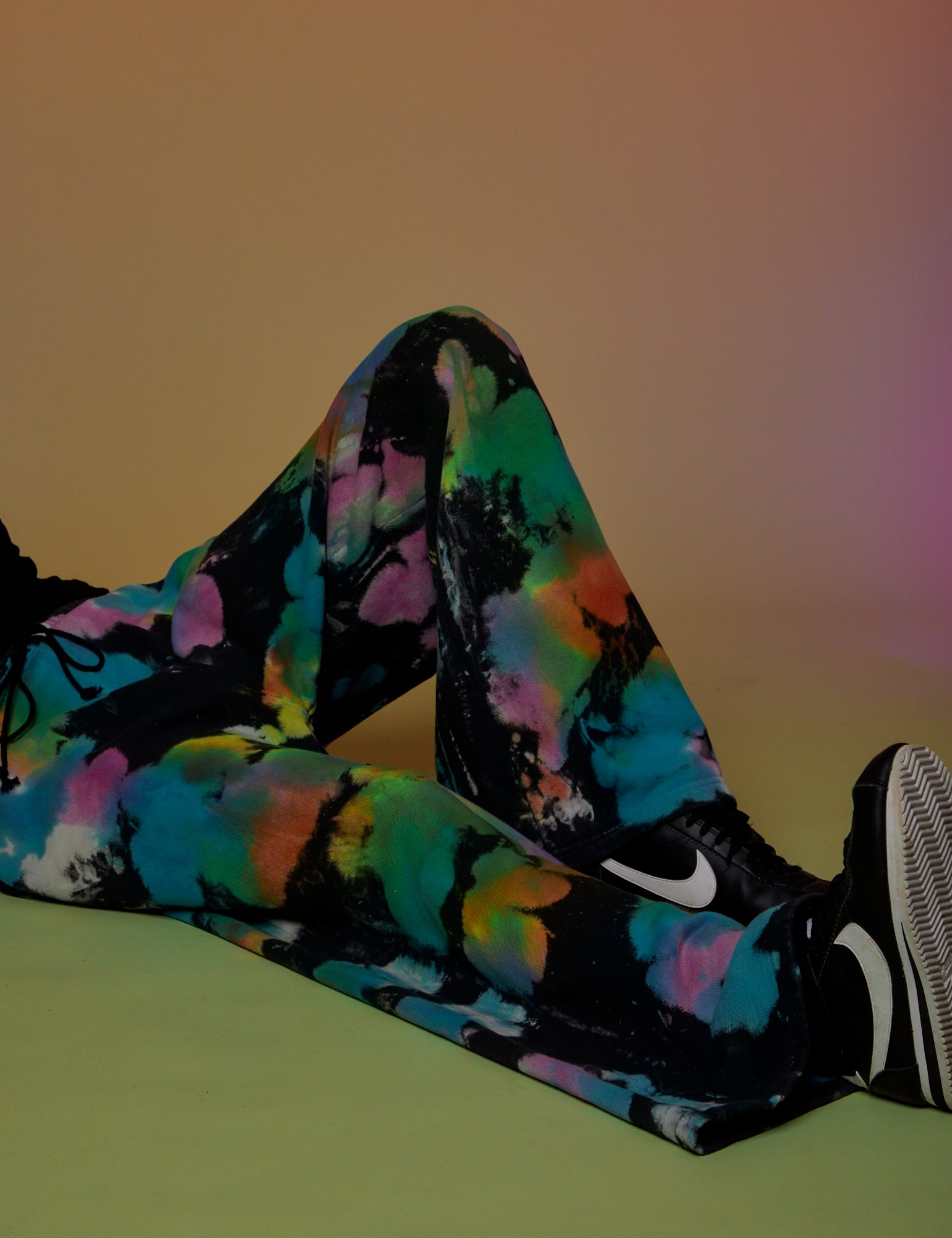 Tie Dyed Wide Leg Sweat Pants pant leg close up on Anthony