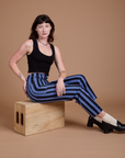 Black Stripe Work Pants in Cornflower Blue and black Cropped Tank worn by Alex