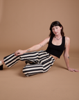 Black Stripe Work Pants in White and black Cropped Tank worn by Alex