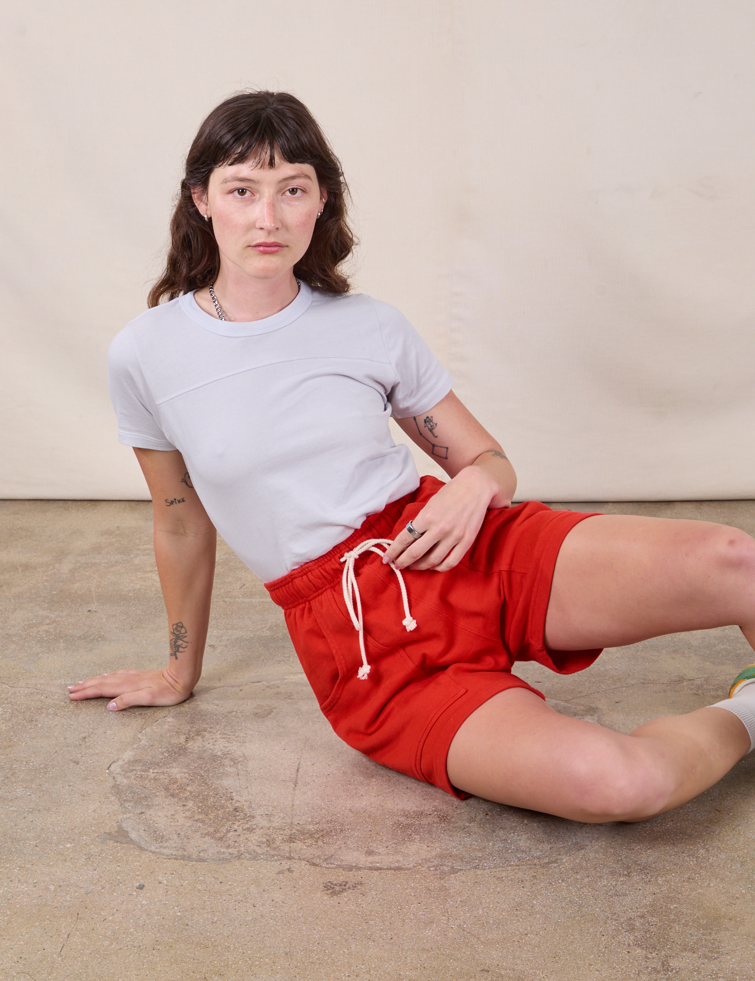 Sweat Shorts in Mustang Red and Jr. Varsity Tee in Stone White on Alex
