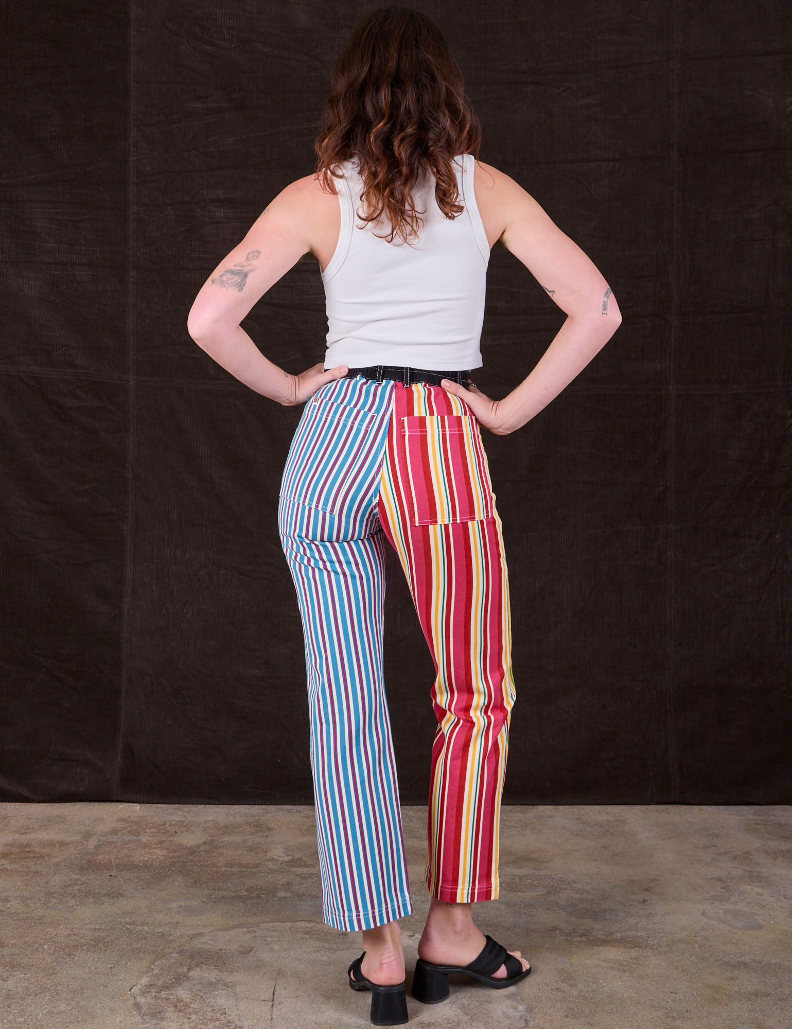 Back view of Mixed Stripe Work Pants and Cropped Tank in vintage tee off-white on Alex