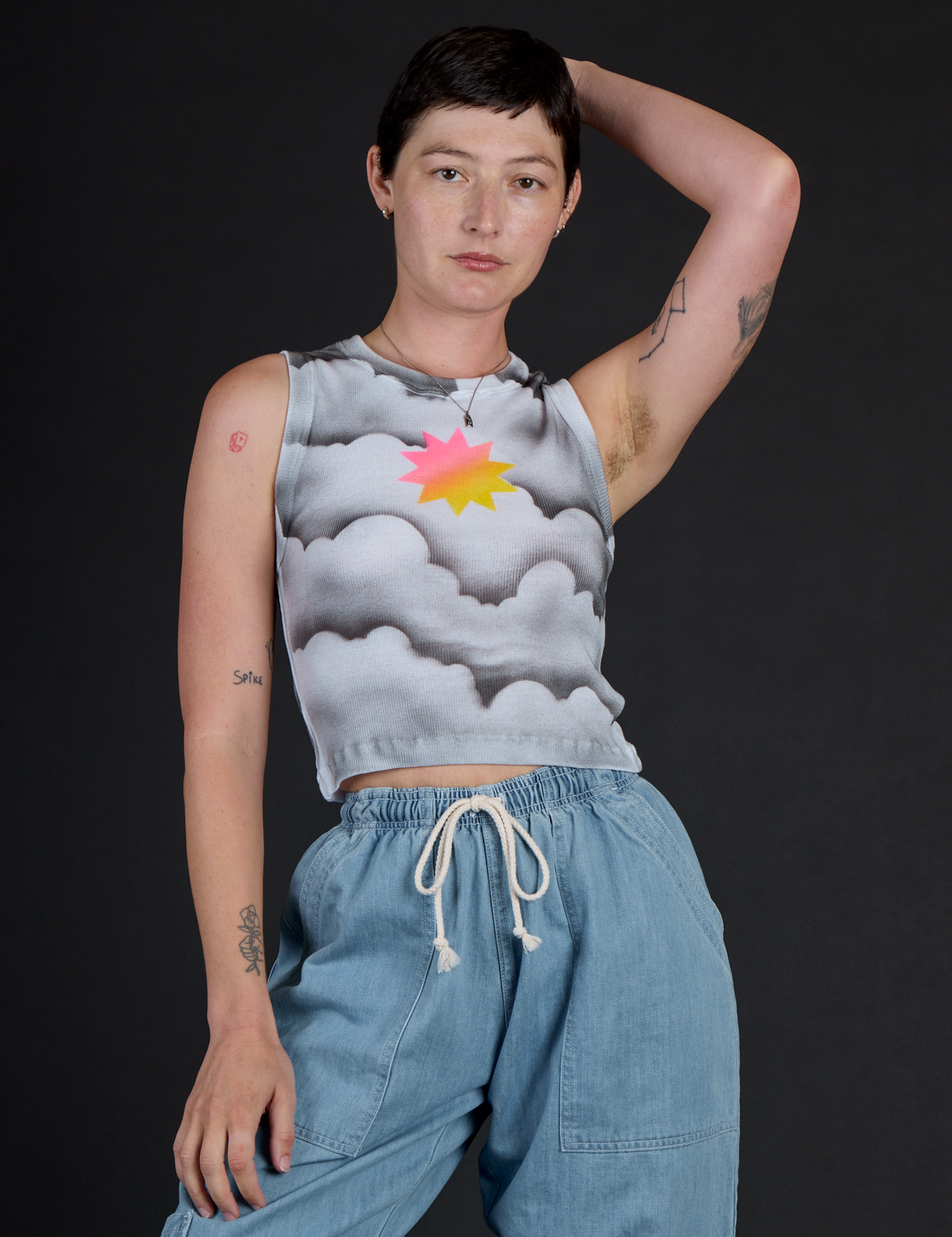 Alex is 5'8" and wearing XXS Dark Cloud Airbrush Muscle Tee