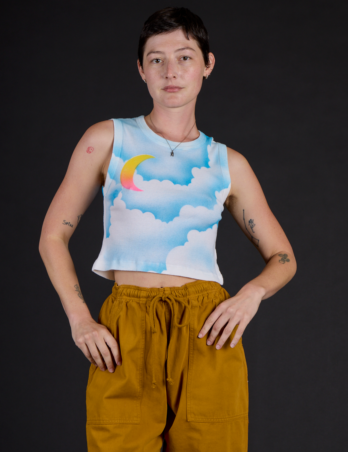 Alex is 5'8" and wearing P of the Morning Moon Airbrush Muscle Tee
