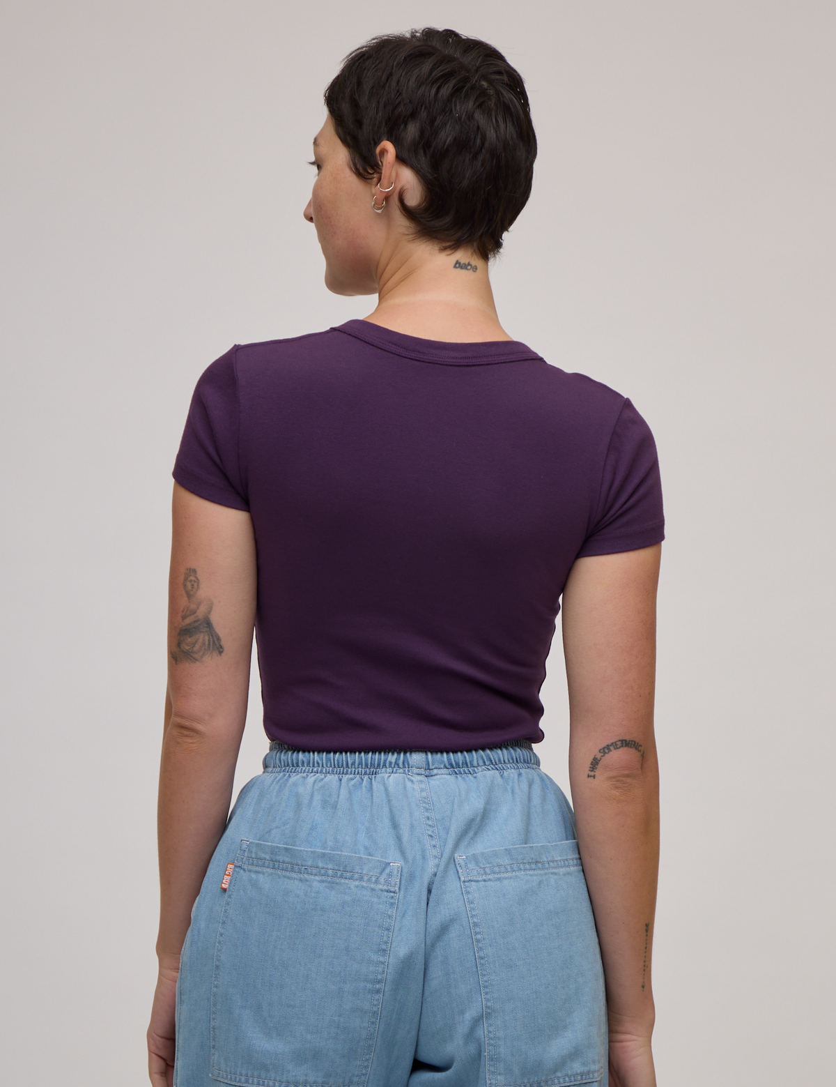 Back view of Baby Tee in Nebula Purple on Alex