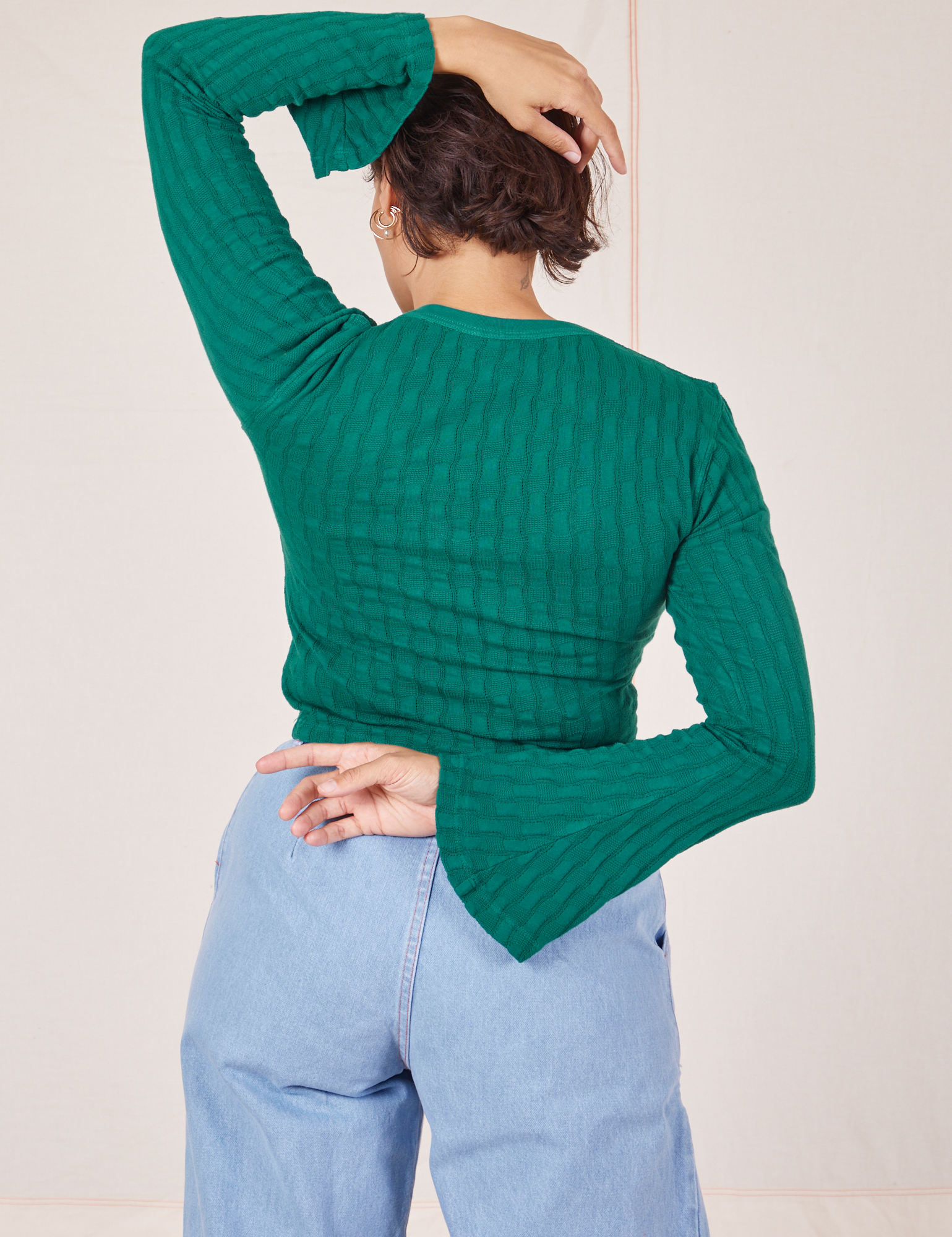 Back view of Bell Sleeve Top in Hunter Green worn by Tiara