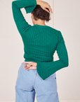 Back view of Bell Sleeve Top in Hunter Green worn by Tiara