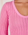 Front close up of Bell Sleeve Top in Bubblegum Pink worn by Gabi