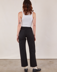 Back view of Work Pants in Black and Cropped Tank in vintage tee off-white on Alex