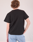 Burly Tee in Basic Black back view on Quinn