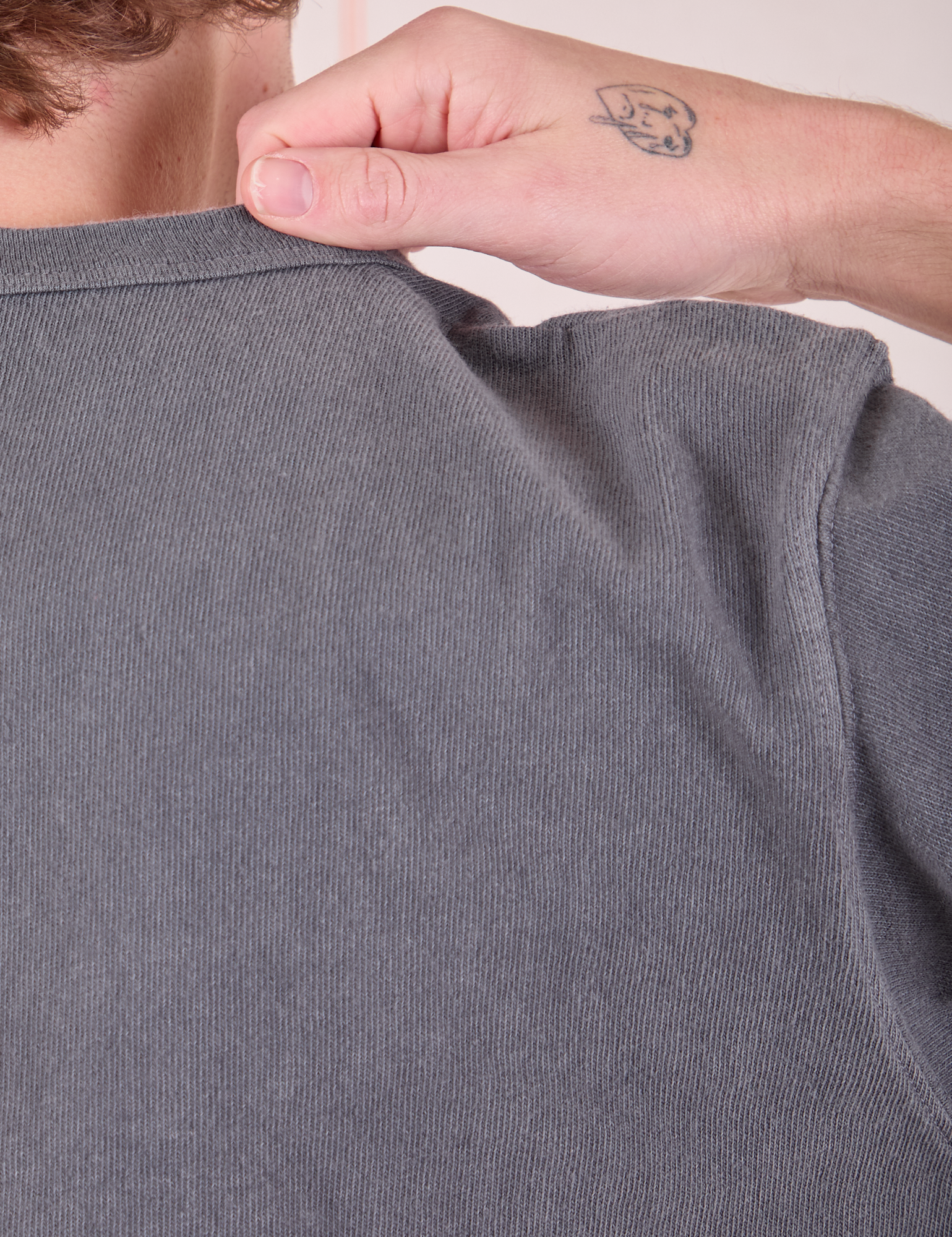 Burly Tee in Washed Grey back shoulder close up on Quinn