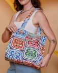 Butterfly Kaleidoscope Shopper Tote worn on model's shoulder