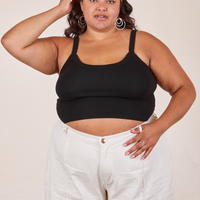 Alicia is wearing XL Cropped Cami in Basic Black worn with vintage off-white Western Pants