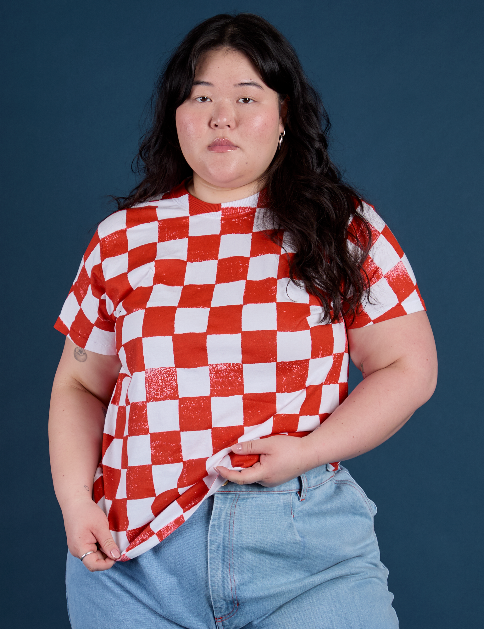 Ashley is 5'7" and wearing L Checker Organic Tee in Red