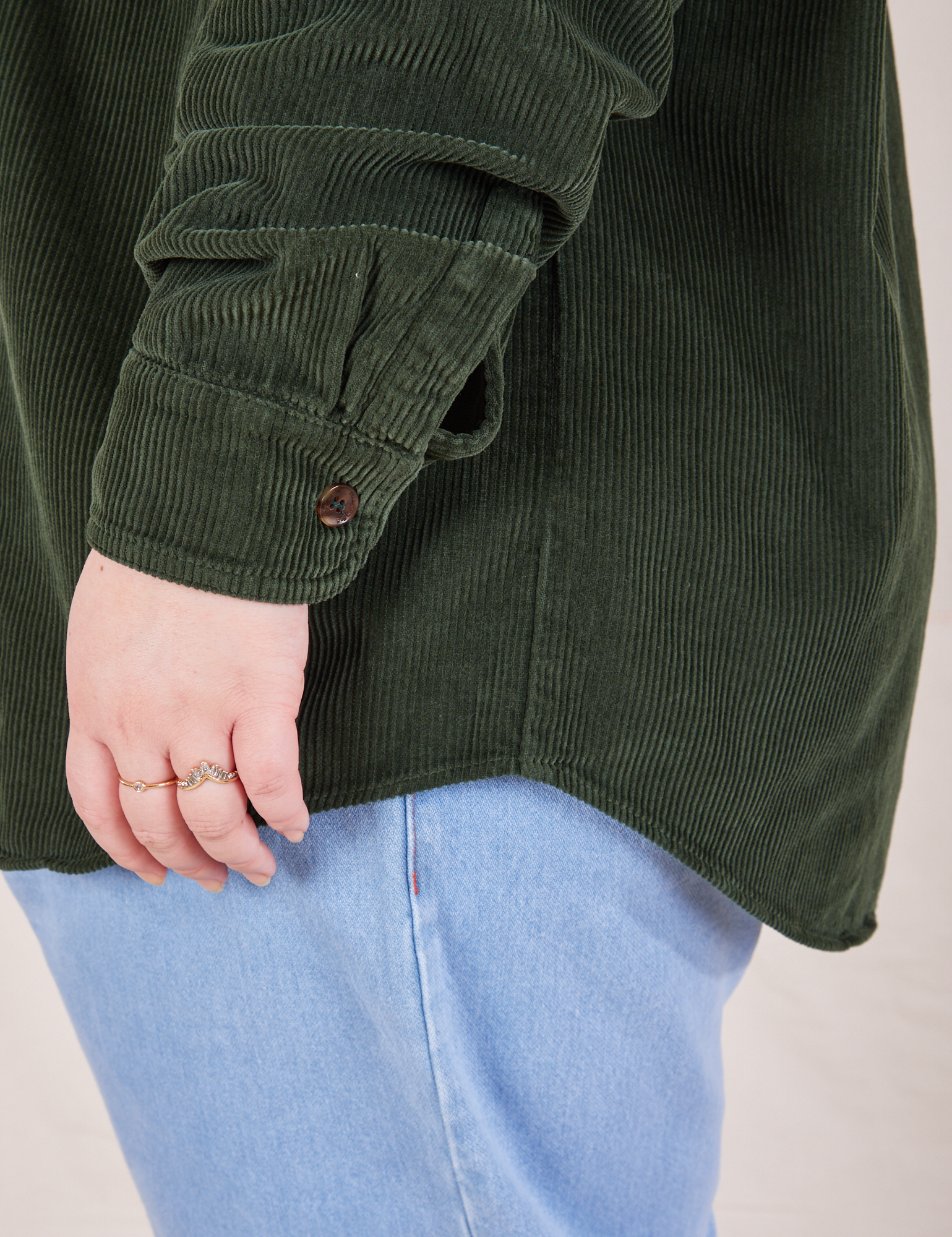 Bottom side view close up of Corduroy Overshirt in Swamp Green on Ashley