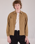 Quinn is wearing Cropped Overshirt in Desert Brown