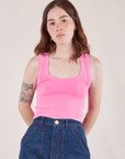 Hana is 5'3" and wearing P Cropped Tank Top in Bubblegum Pink