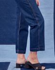 Indigo Denim Original Overalls in Dark Wash pant let side close up on Alex