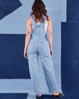 Indigo Denim Original Overalls in Light Wash back view on Alex