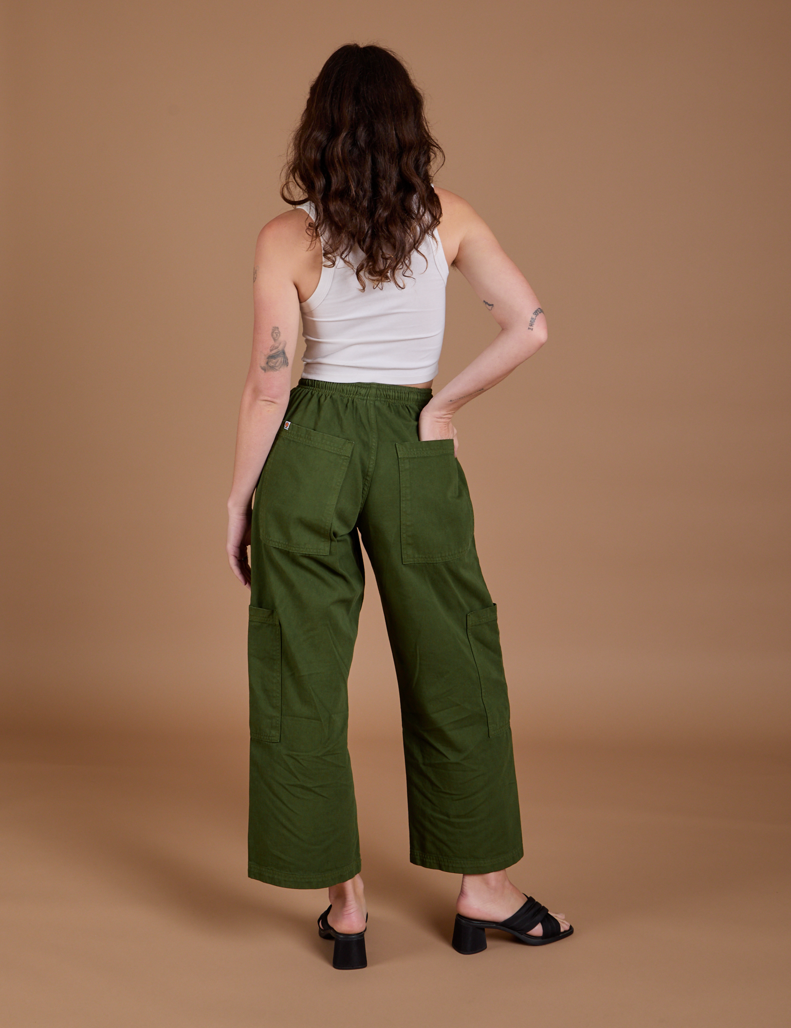 Drop Pocket Cargo Pants in Evergreen back view on Alex
