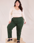 Ashley is 5'7" and wearing 0XL Easy Pants in Swamp Green paired with vintage tee off-white Long Sleeve V-Neck Tee