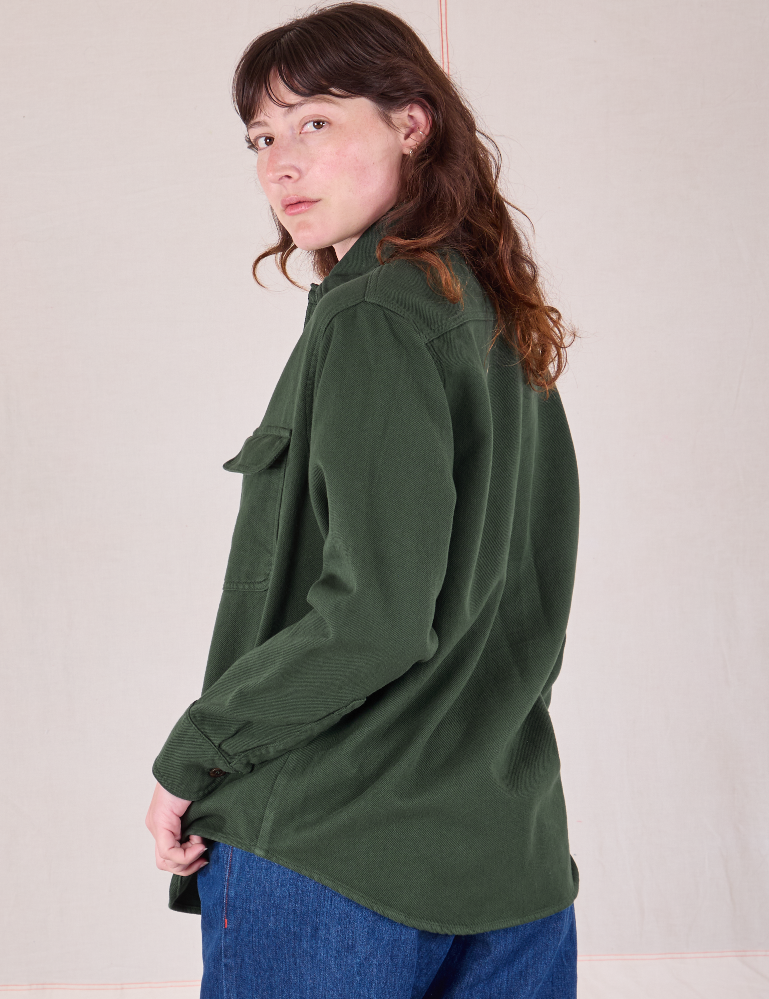 Flannel Overshirt in Swamp Green angled back view on Alex