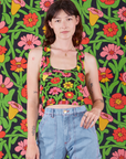 Alex is 5'8" and wearing XXS Cropped Tank in Flower Tangle