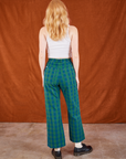 Back view of Gingham Western Pants in Green and Cropped Tank in vintage tee off-white