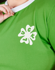Front close up of Luck Tee on Ashley.