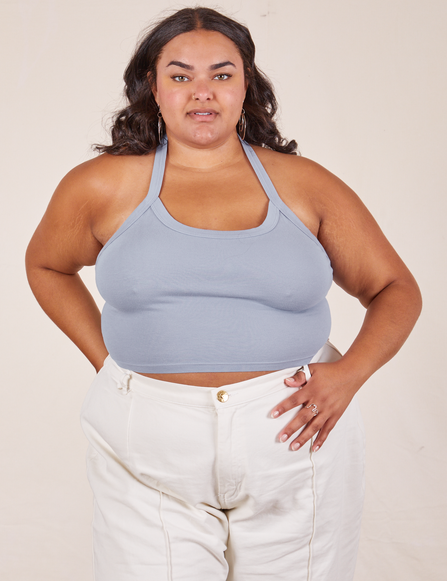 Alicia is 5&#39;9&quot; and wearing XL Halter Top in Periwinkle paired with vintage off-white Western Pants