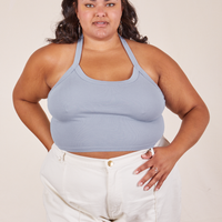 Alicia is 5'9" and wearing XL Halter Top in Periwinkle paired with vintage off-white Western Pants