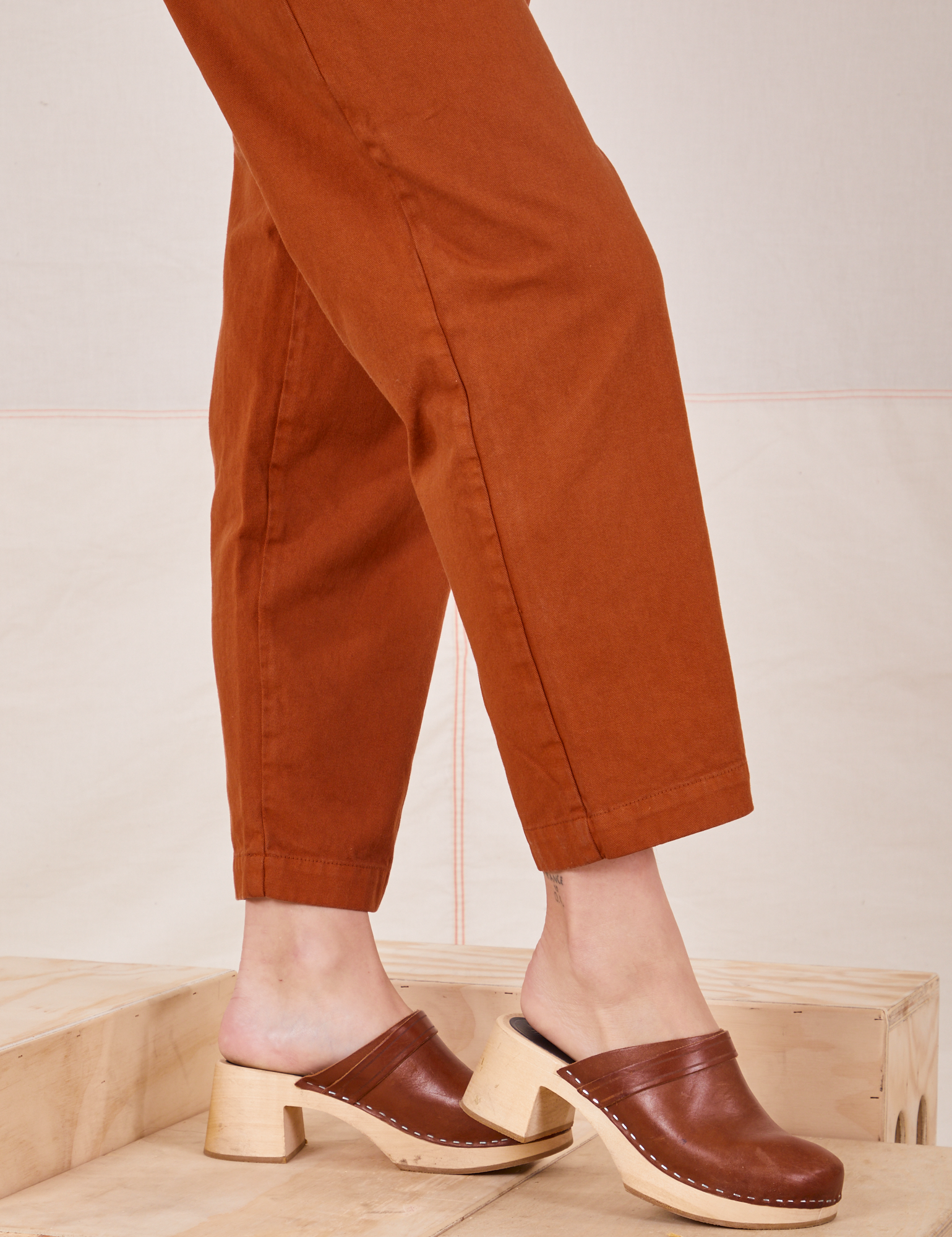 Side view close up of Heavyweight Trousers in Burnt Terracotta on Alex