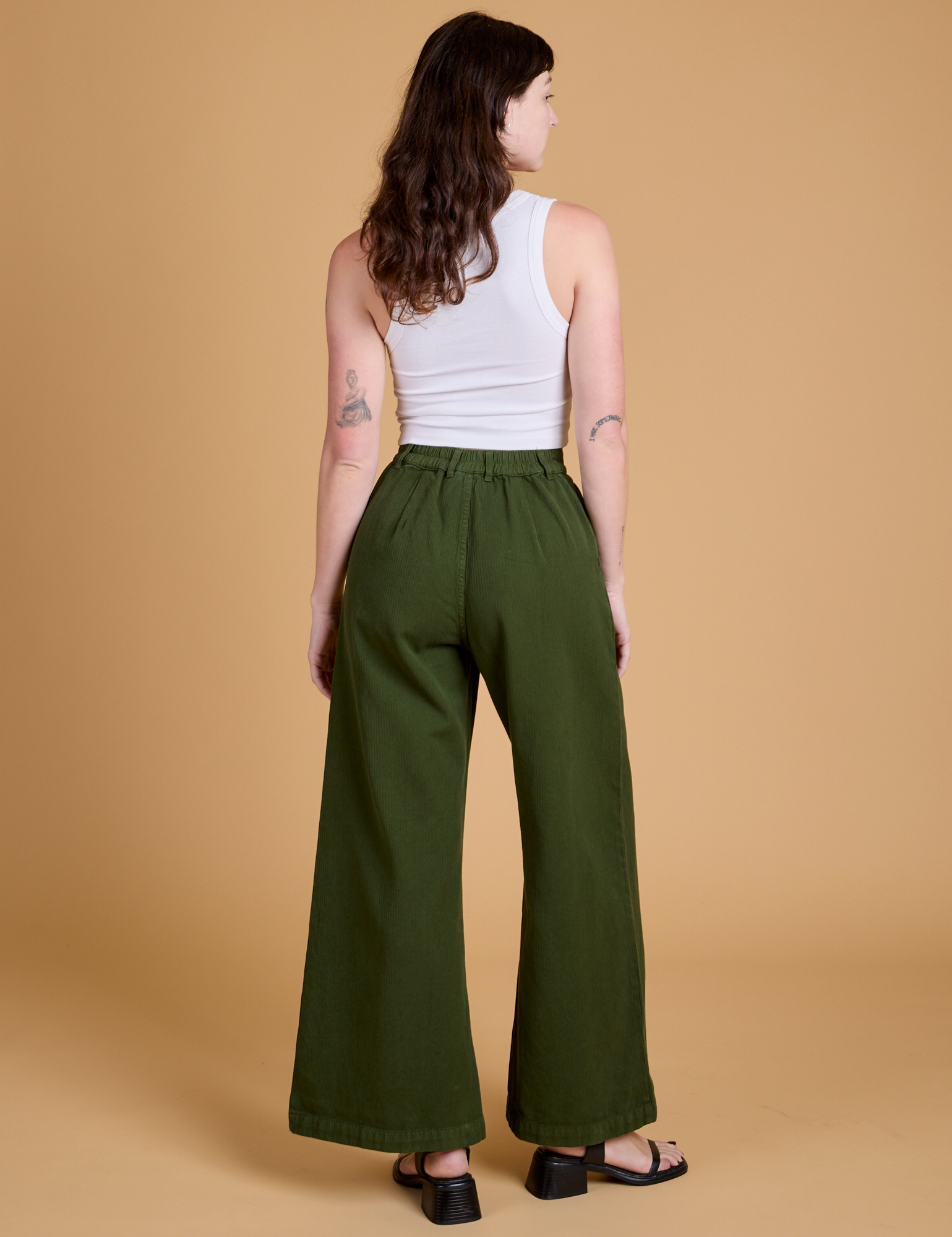 Heritage Wide Leg Trousers in Evergreen back view on Alex