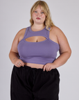 Juliet is 5’7” and wearing L in the Faded Grape Porthole Tank