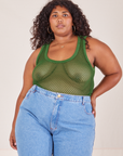 Morgan is 5'5" and wearing XL Mesh Tank Top in Lawn Green